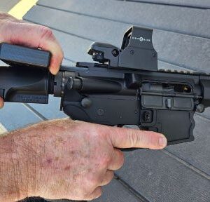 Pulling charging handle on AR pistol